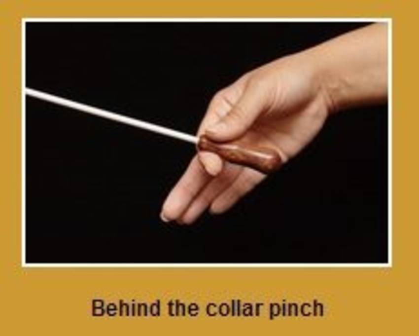 behind_collar_pinch